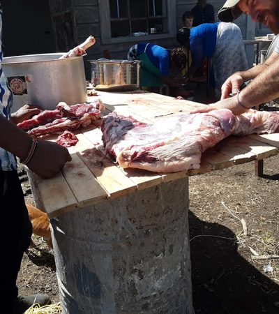 Skinning the goat.