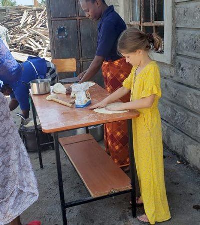 Liberty Gibbs helps to prepare Chapati (A Kenyan native meal)